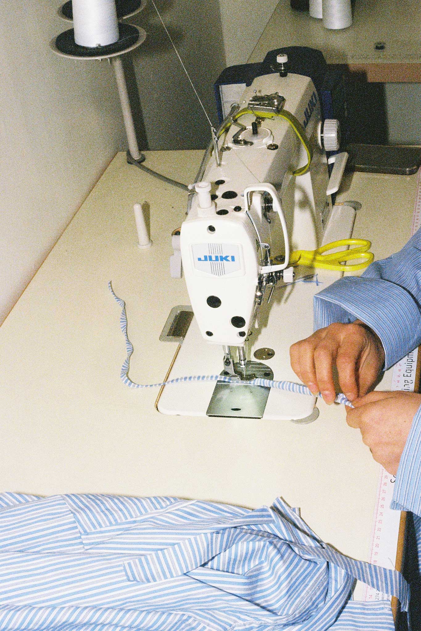 Film photography for Common. Collaboration with designer Joelle Ruck of riel in her studio on 35mm film. Joelle re-works fashion waste into covetable pieces. This is her curve shirt.