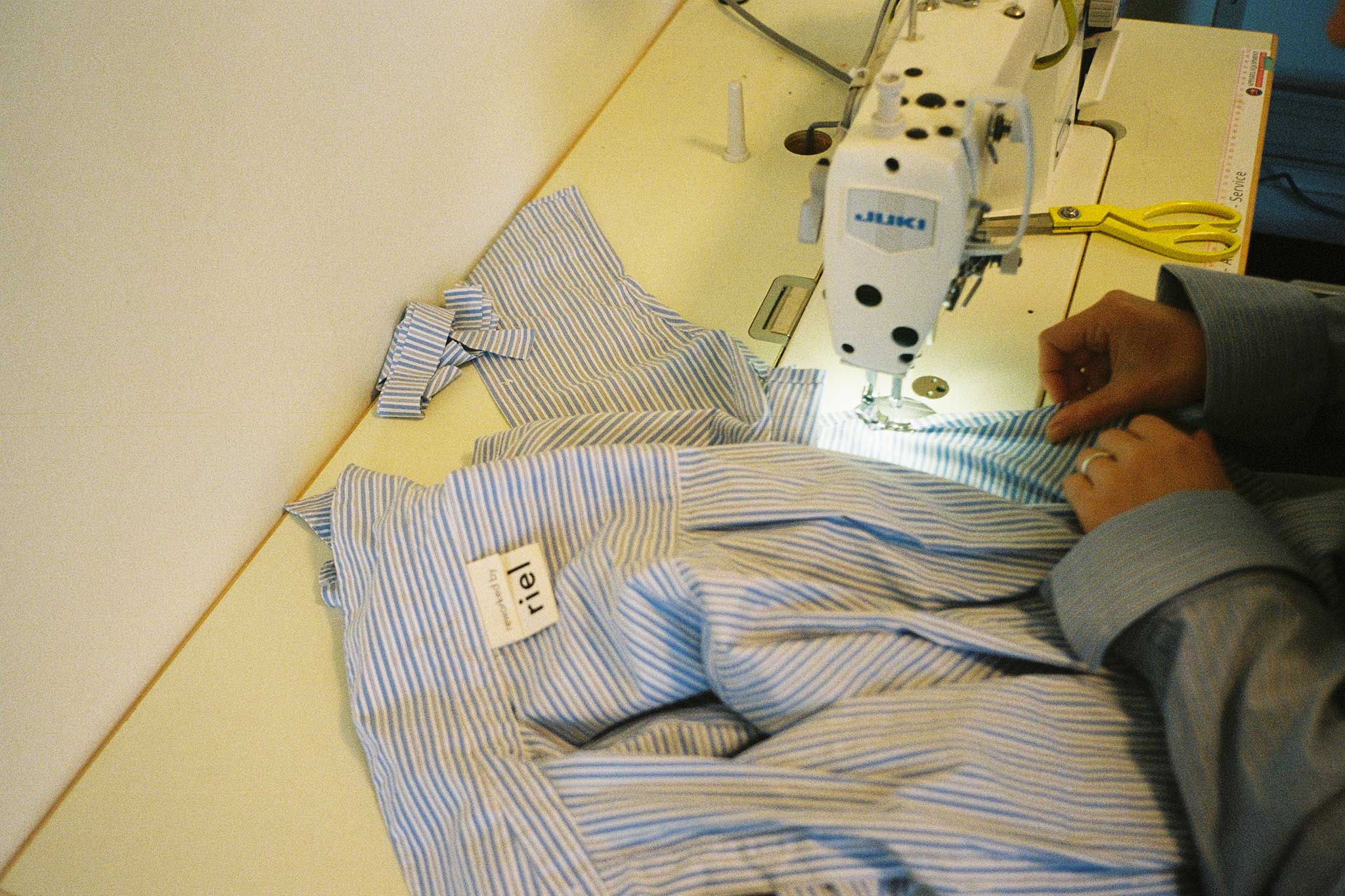 Photography fashion story of designer Joelle Ruck of riel in her studio on 35mm film. Joelle re-works fashion waste into covetable pieces.