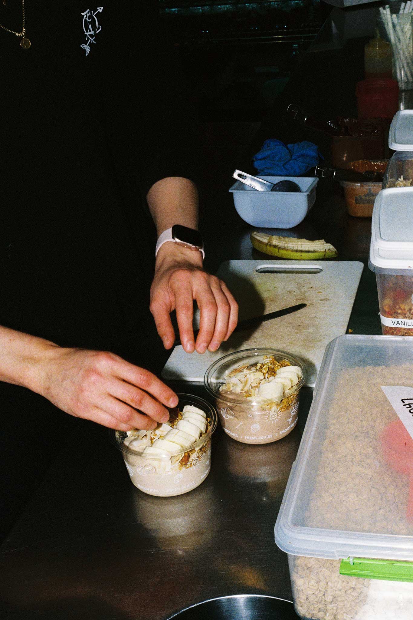 Behind the scenes photography and social media content on 35mm film for Ecoware Packaging at Bowl & Arrow making smoothie bowls.