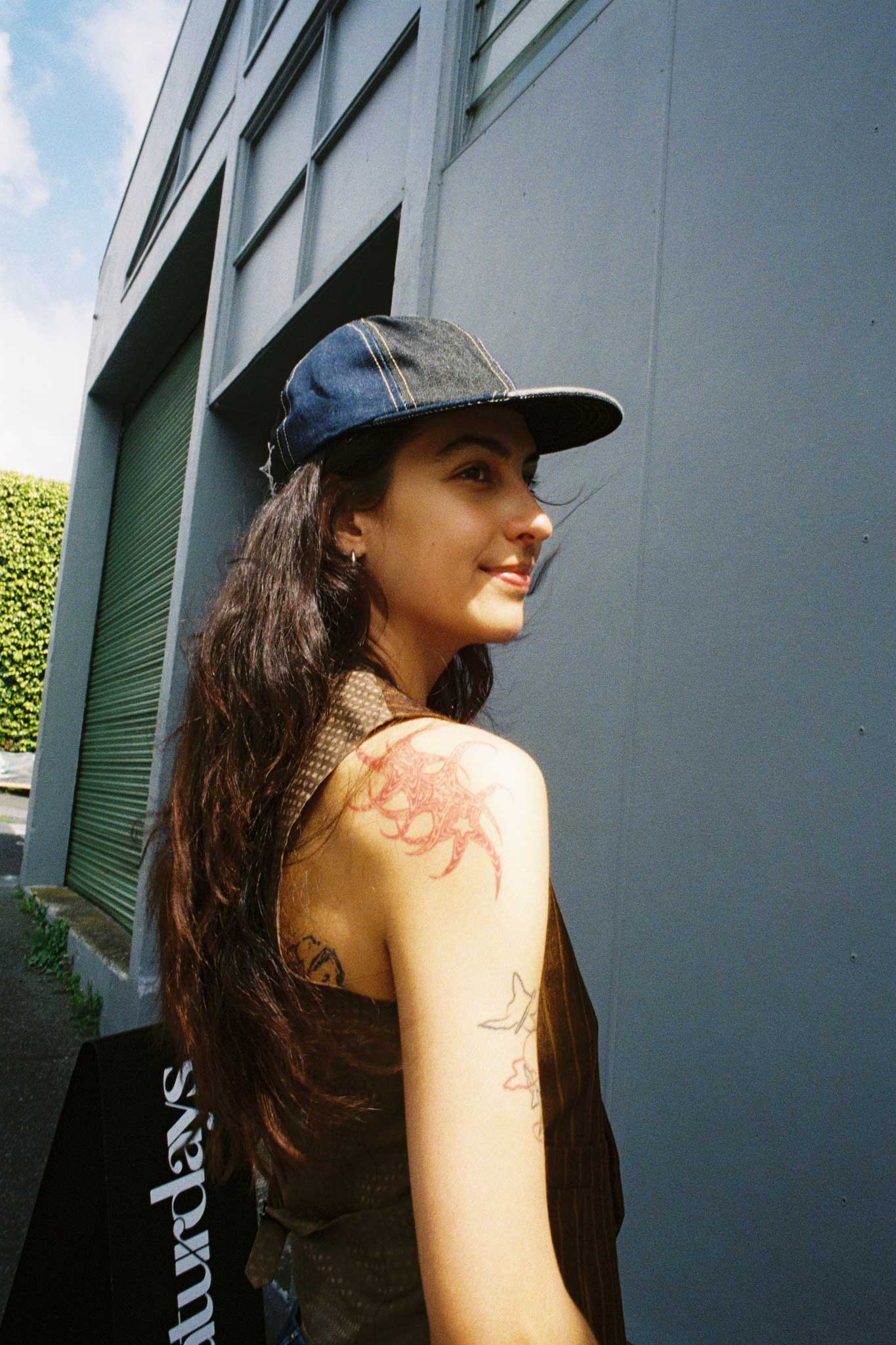 Bella wearing a Common x Ratbags re-worked denim hat. Film fashion photography for Common.