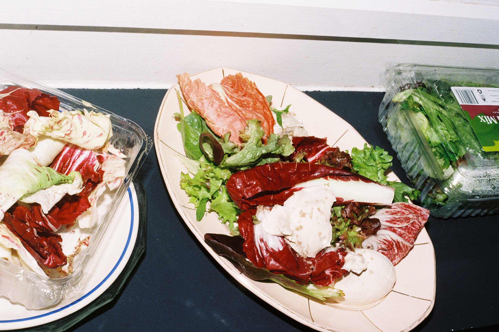 Salad photographed on film with direct flash using Kodak Ultramax. Recipe content for social media and Substack on 35mm film.