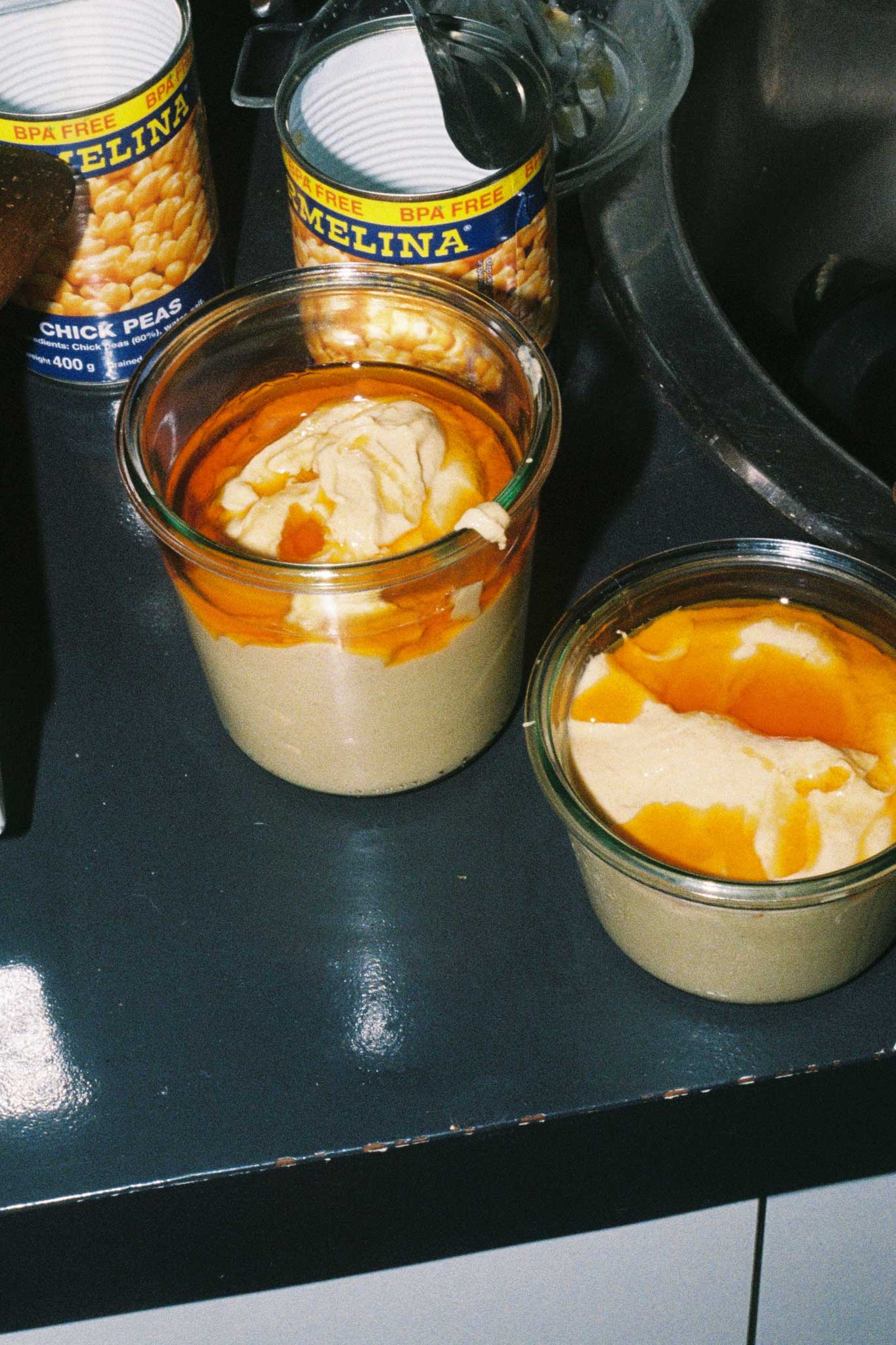 Hummus photographed on film with direct flash using Kodak Ultramax 35mm film. Social content photography for food brands.