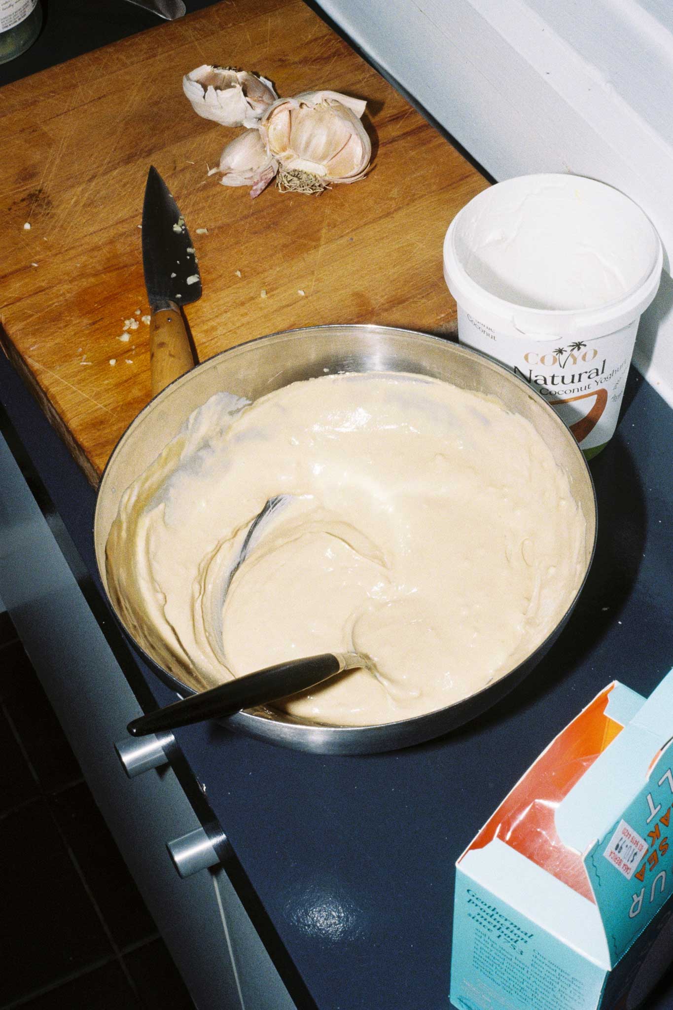 Tahini dressing photographed on film with direct flash using Kodak Ultramax 35mm film. Lifestyle food photography for chefs and Instagram creators.