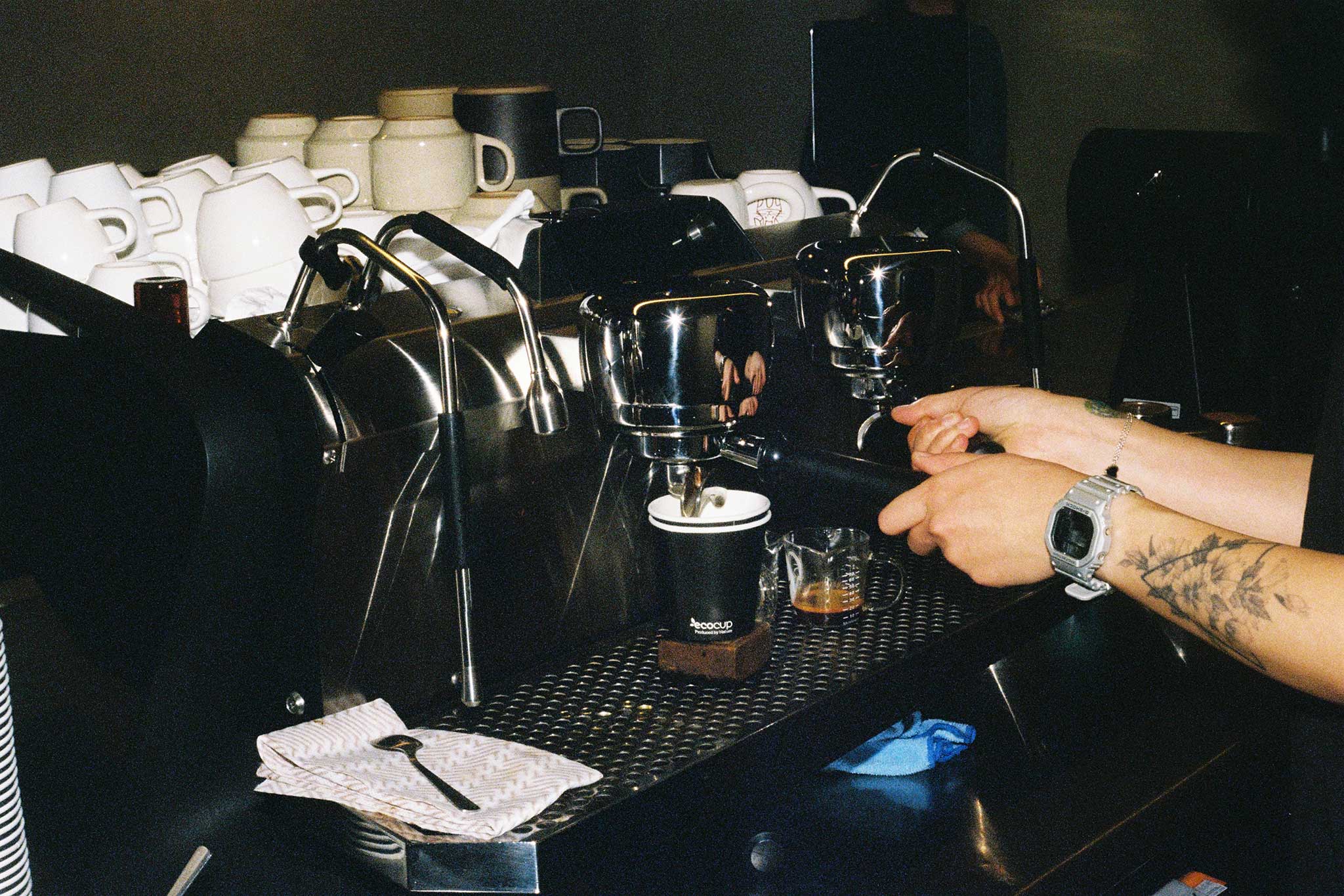 Coffee at specialty coffee shop, Rumours. Social media content photography for cafés on 35mm film with direct flash.