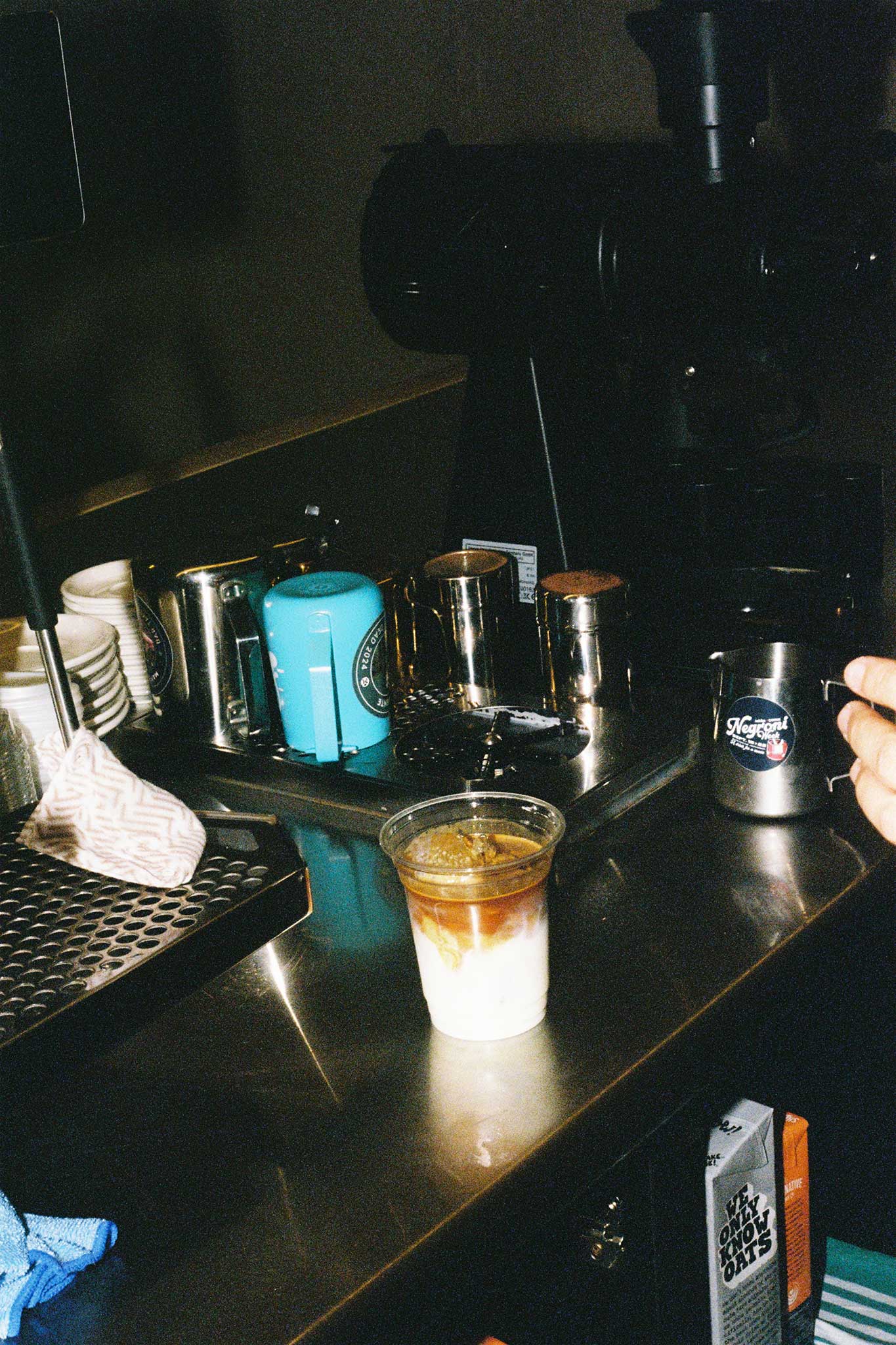 Iced coffee at specialty coffee shop, Rumours. Social media content photography for cafés on 35mm film.